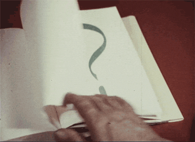 An empty book with a large question mark on the page